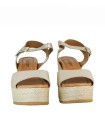 SANDALIAS DEL PIEL METALIZADA CON CUÑA DE RAFIA PENELOPE 6523 ORO